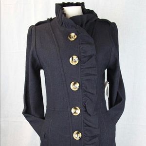 Beautiful wool ruffle front jacket.